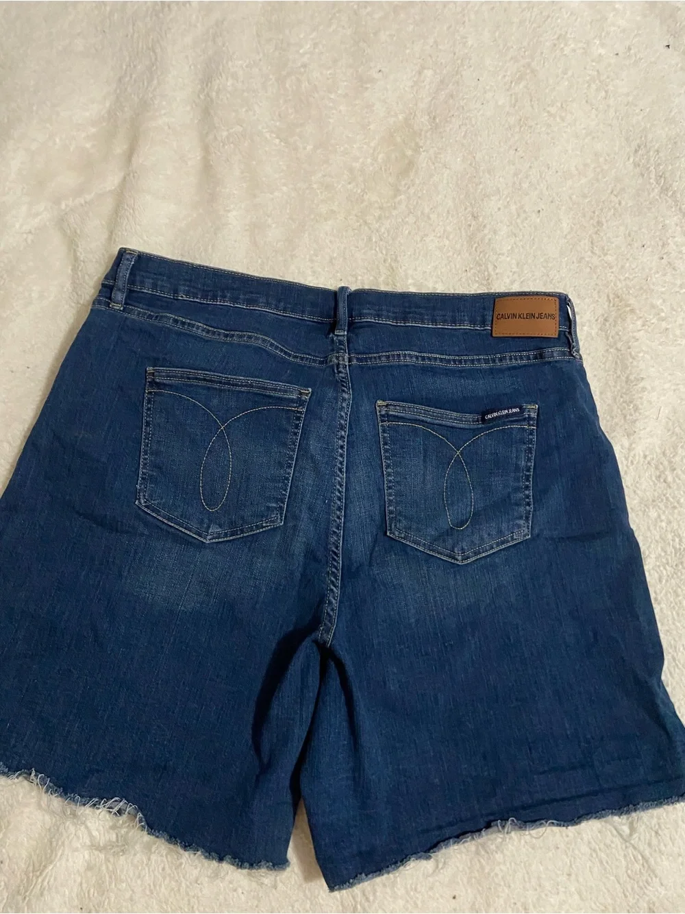 Calvin Klein Indigo Denim Cutoff Shorts